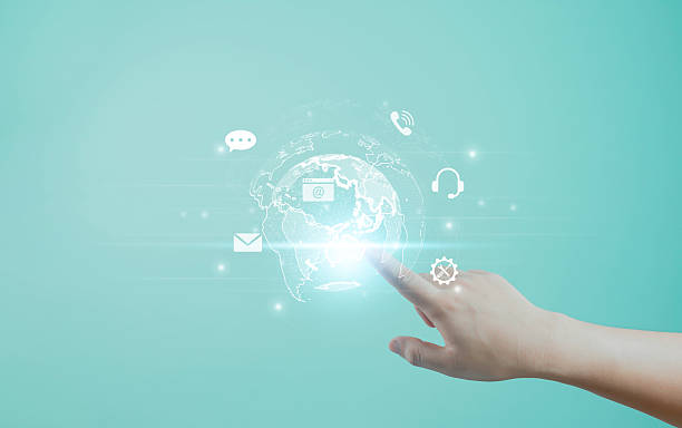 istock Hand touching digital globe with communication and technology icons, symbolizing global connection, online communication, digital marketing, and customer support network concept. 2244915525