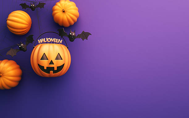 istock Halloween Pumpkins and Bats on Purple Background 2244916161
