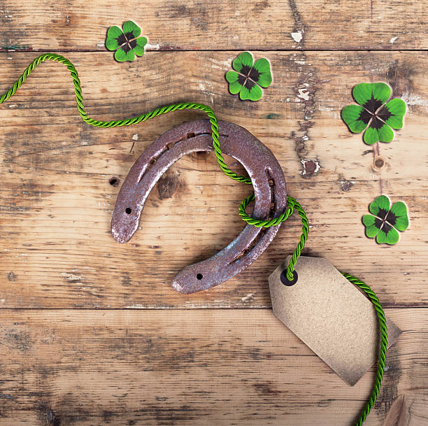Timeless Luck: Old Horseshoe with Graceful Ribbon on Rustic Wood for 2026