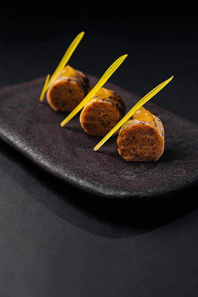 Innovative dish featuring unique flavors served on a dark platter