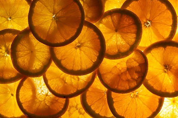 This vibrant image of citrus slices, including oranges and grapefruit, is arranged to create an eye-catching and refreshing visual, perfect for culinary or health-related themes emphasizing freshness and zest.