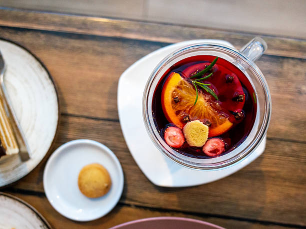 istock Warm mulled wine with garnishes, Charming glass mug with festive mulled wine 2244929991