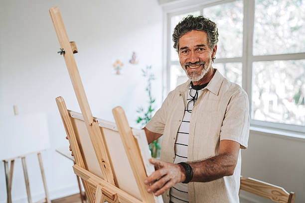 istock Painting instructor preparing classroom for course, painting studio 2244931646