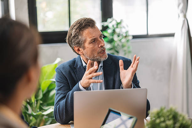 istock Business Meeting with Engaged Discussion and Insights 2244934162