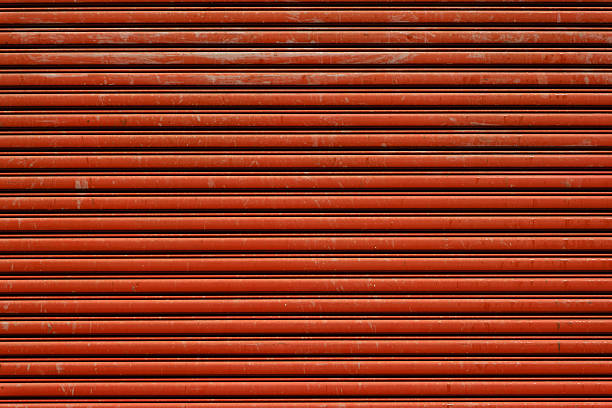 istock Orange brown old garage door background 2244934392