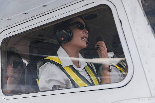 istock Female pilot communicates with crew during flight training session at small airport 2244935438