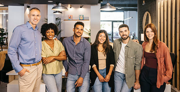istock Diverse business team smiling at modern office 2244935831
