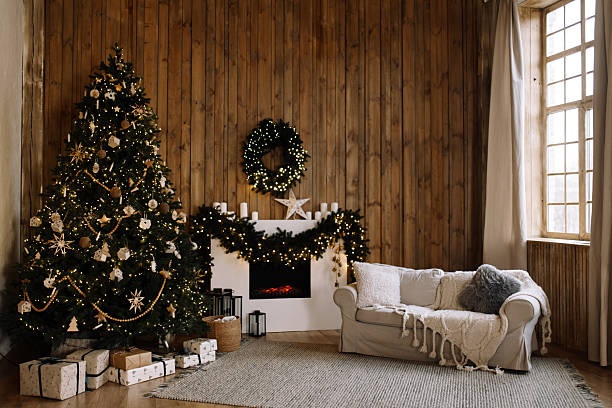istock Cozy Christmas interior with fireplace and gifts 2244936002