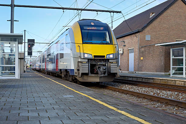 istock Sleek commuter train pulling into a European railway station, showcasing efficient public transport and modern design. 2244937398