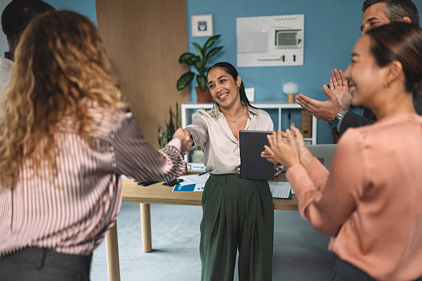 istock Business handshake and teamwork in modern office 2244938679