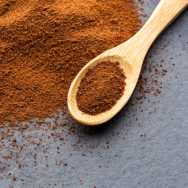 istock Organic dry coffee in a spoon - Coffea 2244939016