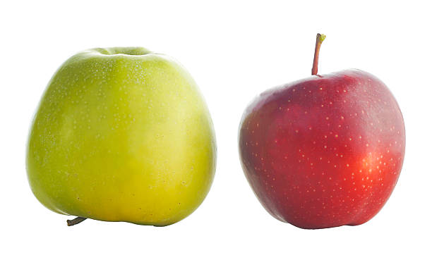 istock red and blue apples on a white background 2244942596