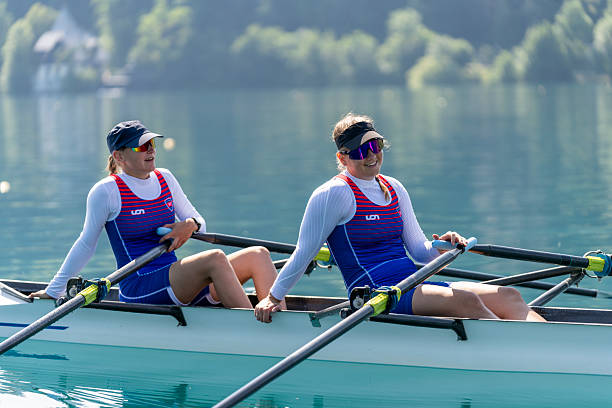 istock Energetic Young Women Rowing Across Lake Bled in Dynamic Training Session 2244943024