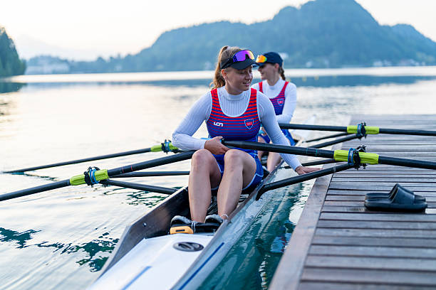 istock Joyful Young Caucasian Female Rowers Preparing for Training on Lake Bled 2244943085