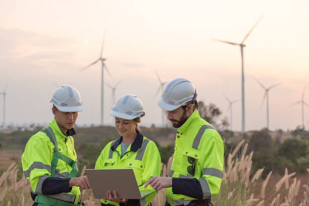 istock Wind Turbine Maintenance and Repair Technician, Engineer Checking Turbines working maintenance clean power generator system 2244943350