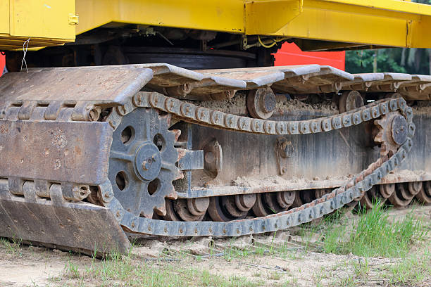 istock heavy construction equipment tracks and drivetrain 2244953026