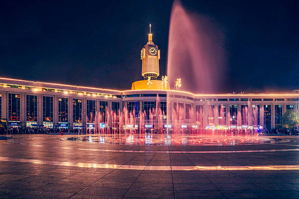 City fountain with blue neon lights.