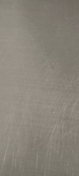 istock Used stainless steel sheet has scratches. 2244955070