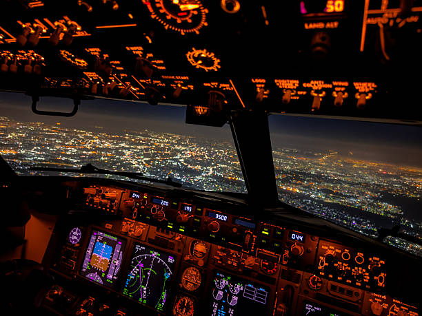istock Dreamscape Flight – Glowing Airliner Cockpit Above a City at Night 2244956482
