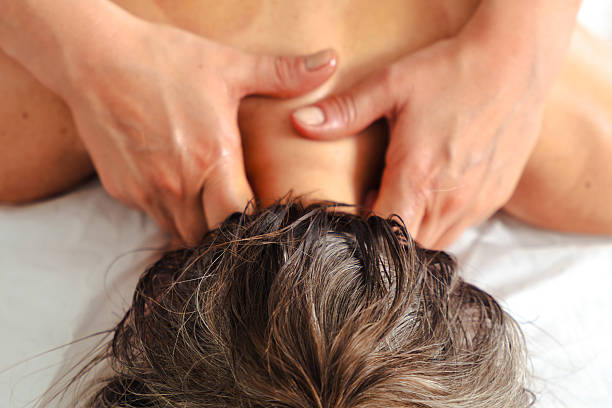 istock Unrecognizable therapist giving relaxing leg massage to client in professional spa setting 2244960771