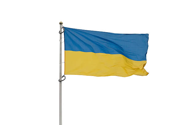 istock Ukrainian flag on the flag pole isolated on a white background 2244964372