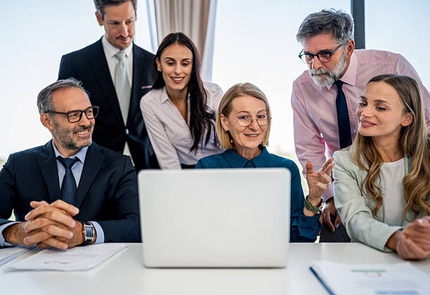 istock Diverse business team collaborating on laptop during office meeting 2244964513