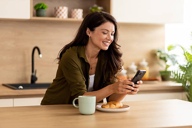 istock Morning routine with coffee and smartphone at home 2244969701