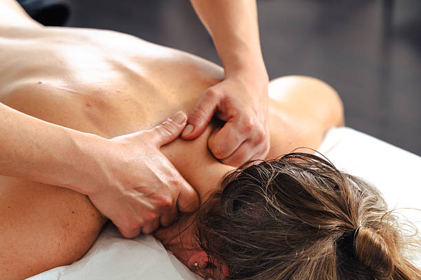 istock Unrecognizable therapist giving relaxing leg massage to client in professional spa setting 2244972019