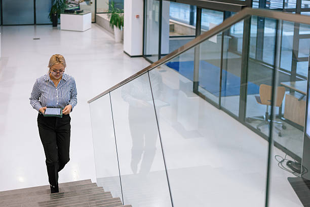 istock Business professional climbing stairs 2244973660