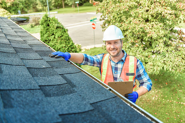 istock man with hard hat standing on steps inspecting house roof 2244973878