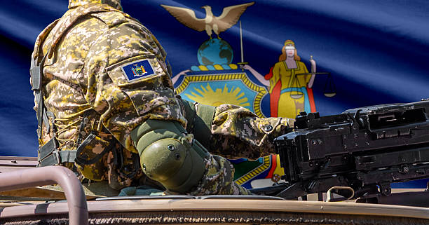 istock New York US state flag with soldier at machinegun turret 2244987846