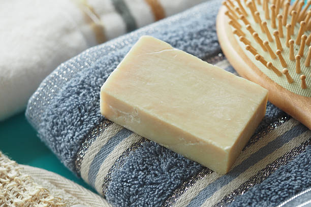 istock Handmade soap resting on soft towels in a spa setting 2244987898