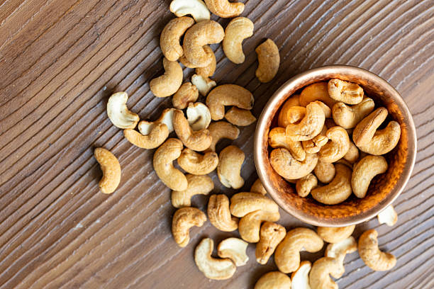 istock Close-Up of Peanuts in Copper Bowl 2244988394