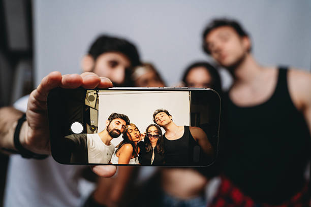 istock Friends taking a fun selfie with smartphone 2244990712