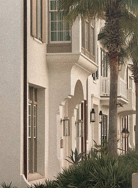 istock Coastal Mediterranean Architecture with Palm Trees 2244990867
