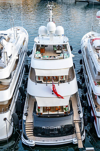 The marina at Monte Carlo on the French Riviera with it’s luxury powerboats with the high-rise apartment buildings crowded in behind. The harbour serves those in Monte Carlo and the adjacent principality of Monaco, making it home to some of the world’s most expensive yachts and power boats. Good copy space.