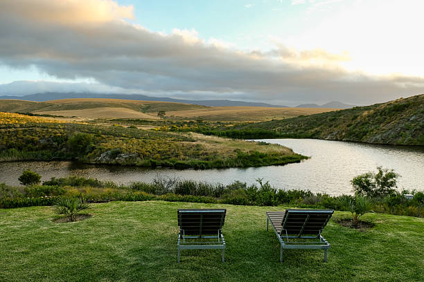 Two chairs near the lake