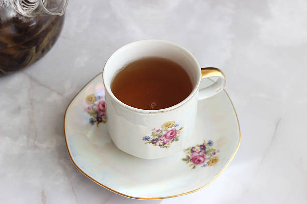 istock A cup of herbal tea stands on a light table 2244993685