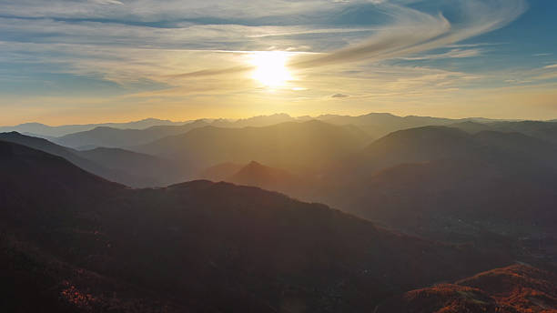 istock Flying over colorful foliage at sunset in mountains 2244998755
