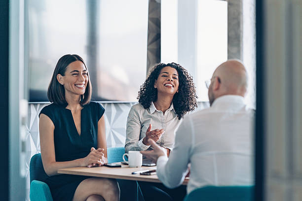 istock Business team having a meeting view through an open office door 2244999735