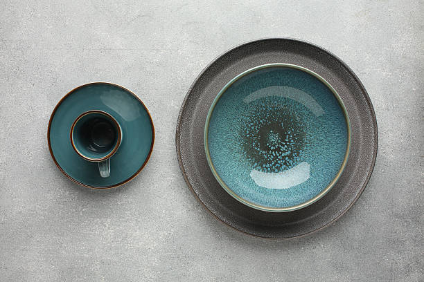 istock Set of kitchenware on grey marble table near light wall. Modern interior design 2245000608