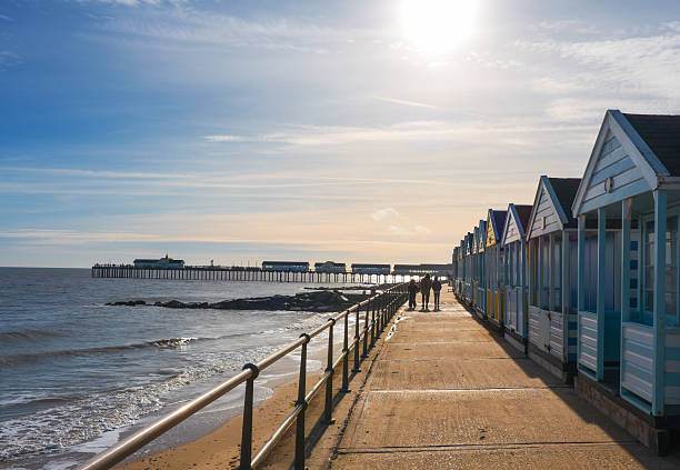 North Sea coast in Kirkley, Lowestoft, Suffolk, England, UK with the Claremont Pier and a wave breaker
