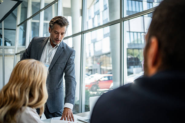 istock Business colleagues collaborating during a corporate meeting 2245002389