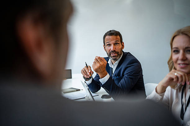 istock Business man talking and gesturing during meeting 2245002514
