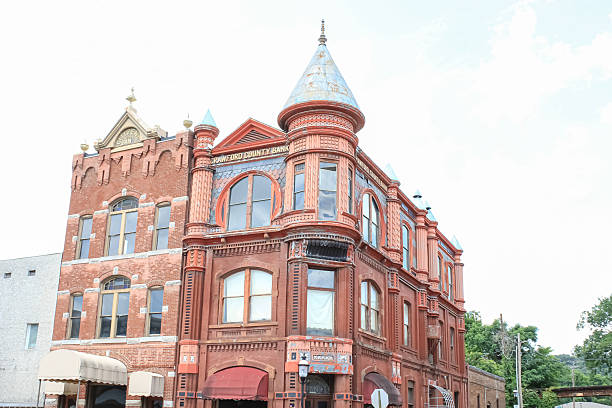 A historic bank building with a Victorian turret on the corner in Van Buren, Arkansas