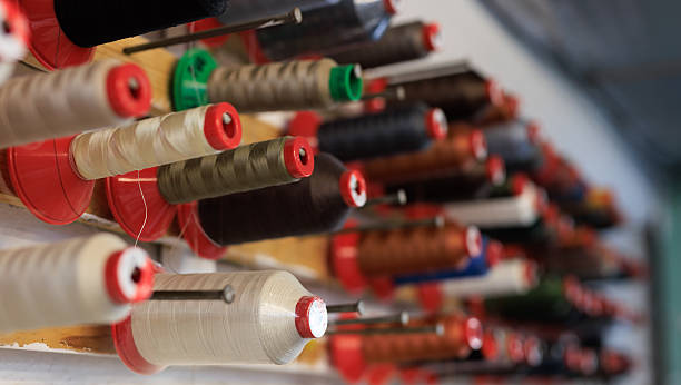 istock Collection of threads of different colors in a sewing workshop 2245006830