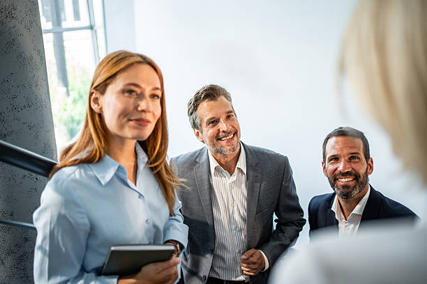 istock Business people engaging in a meeting while smiling 2245007543