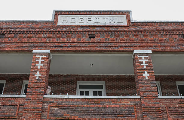 Old red brick hospital building in old town