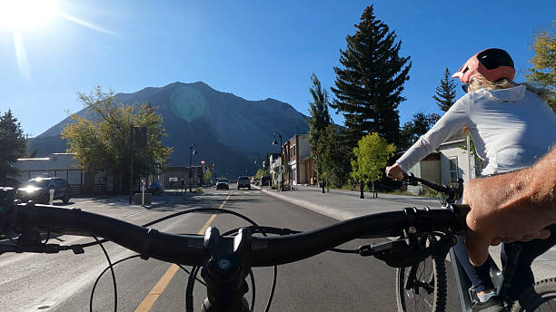 istock Personal perspective of couple riding e-bikes downtown, Bellevue 2245010373