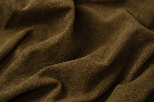istock Green fabric texture as a background. Top view. 2245026951